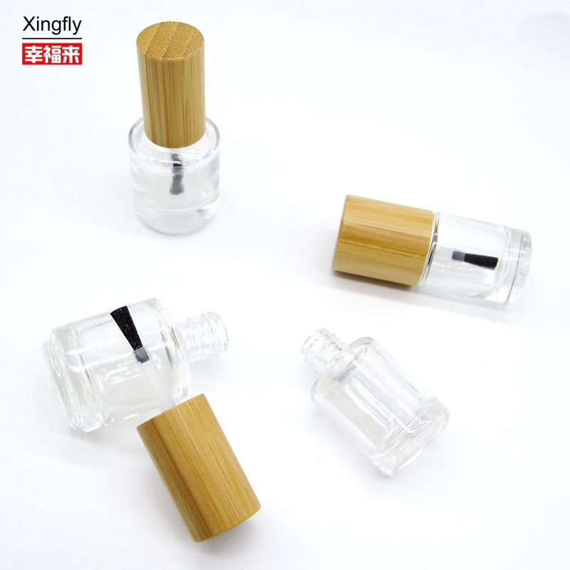 Botella redonda de esmalte de uñas de 11 ml con tapa de madera Gel UV vacío Botella de pegamento de esmalte de uñas